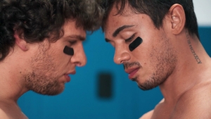 Men: Two Athletes Share a Passionate Kiss